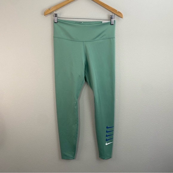 Nike Pants - Nike Tight Fit Mid Rise 7/8 Length Green Leggings‎ NWT Woman’s Size Medium